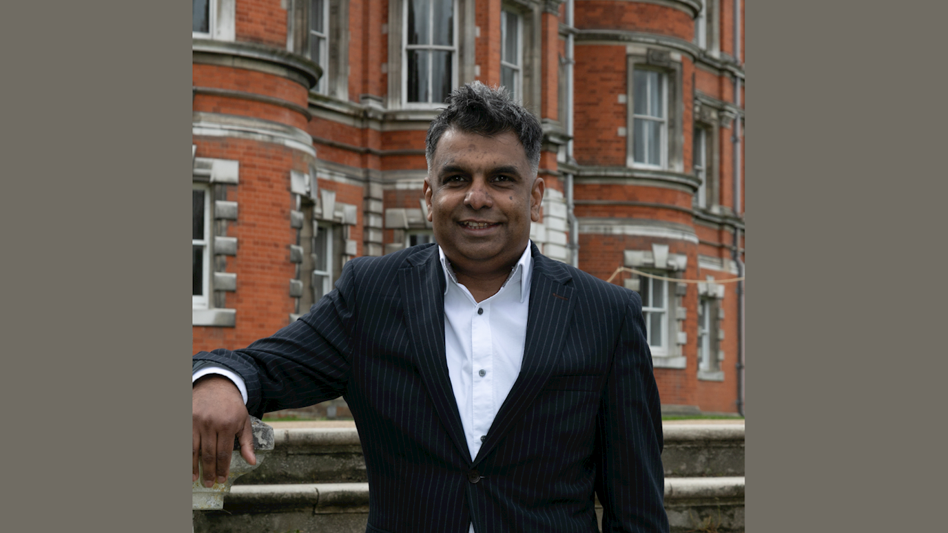 Professor Sameer Hosany, Head of Department of Marketing, in front of Founders Building