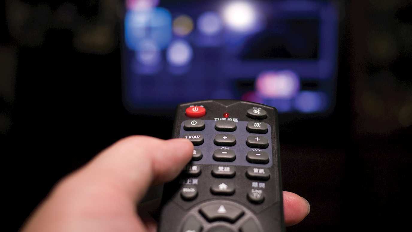 Remote control pointing at screen - Media Arts