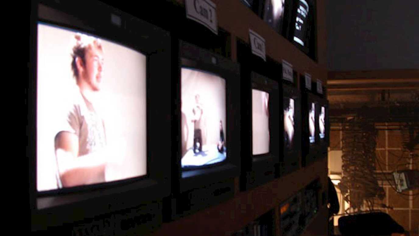 a bank of screens in the tv studio - media arts